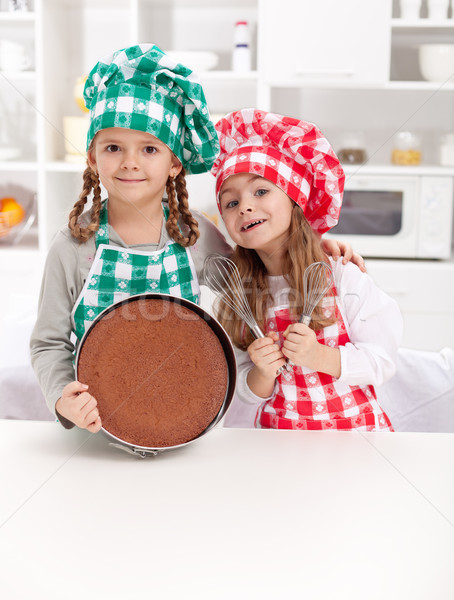 Küçük şefler kek gülen pişirme Stok fotoğraf © ilona75
