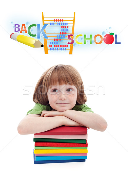 Foto stock: Criança · escola · primária · sorrir · livro · cabelo · vermelho