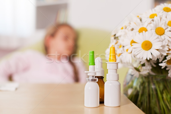 Allergy season concept with blurry person in background and medi Stock photo © ilona75