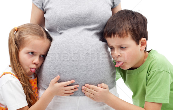 Stock photo: Kids not happy to have a new sibling