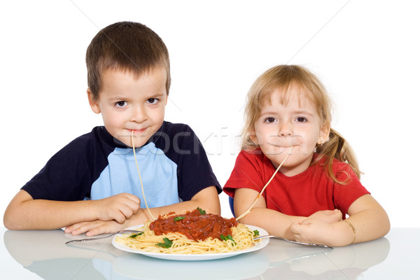 Stockfoto: Kinderen · eten · pasta · gelukkig · meisje · glimlach