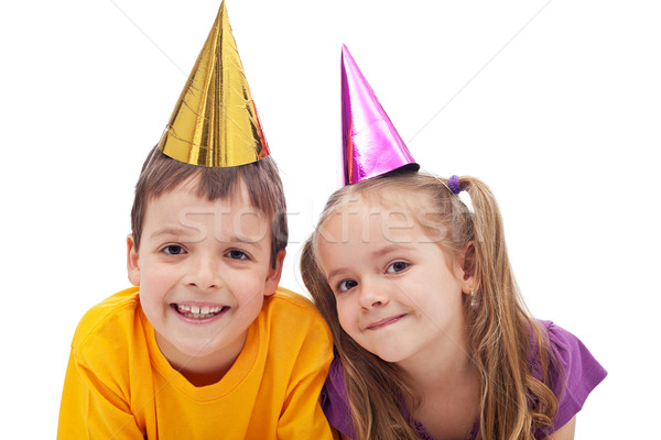 Stock photo: Happy kids with party hats
