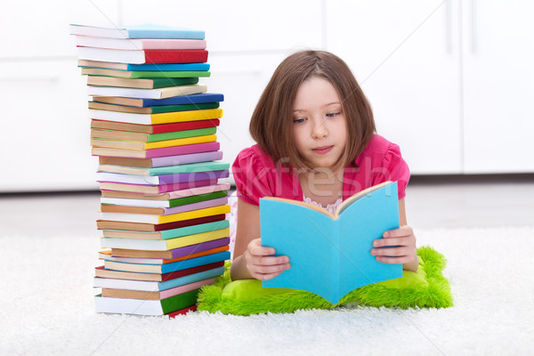 Young girl with lots of books Stock photo © ilona75