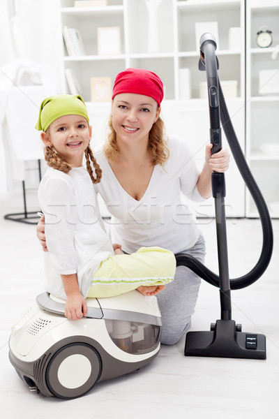 Cleaning day - woman and little girl with vacuum cleaner Stock photo © ilona75