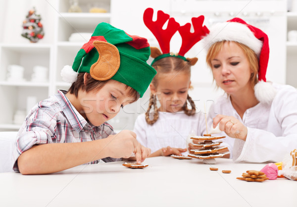 Kids decorating gingerbread cookies Stock photo © ilona75