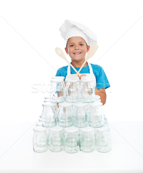 Happy chef girl with lots of jars for canning Stock photo © ilona75