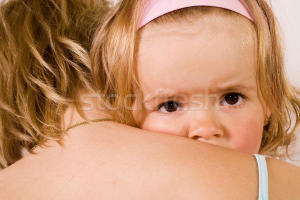Little girl cuddling with her mother - closeup Stock photo © ilona75