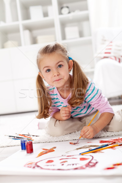 Little artist girl painting Stock photo © ilona75