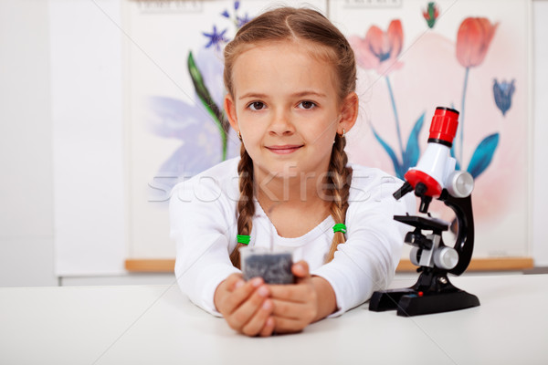 Young girl in biology class Stock photo © ilona75