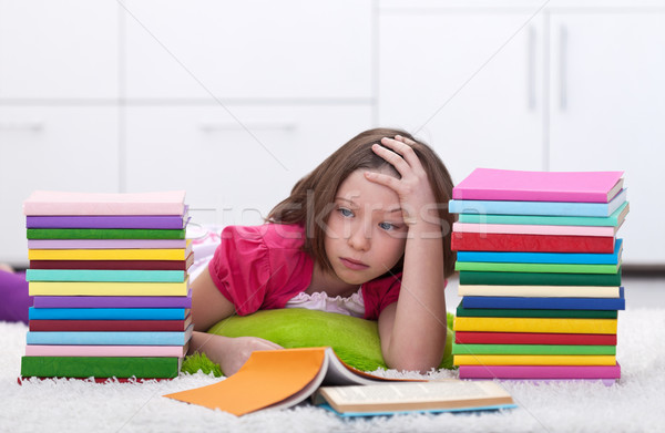 Young girl tired learning Stock photo © ilona75