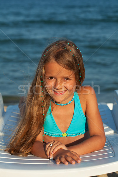 Little girl brilhante luz do sol beira-mar Foto stock © ilona75