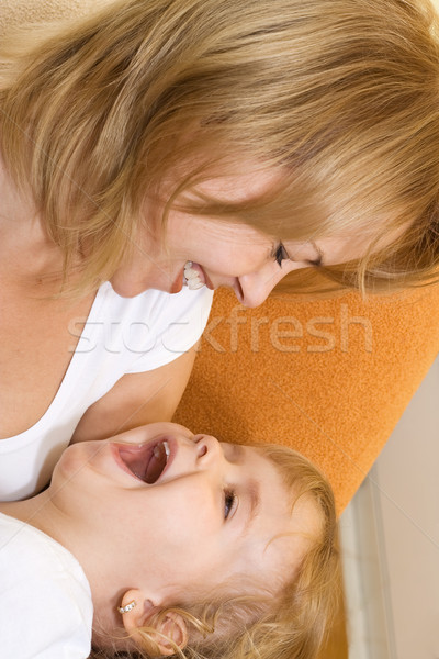 Stock photo: Woman and little girl playing