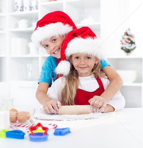 Kids having fun preparing christmas cookies Stock photo © ilona75