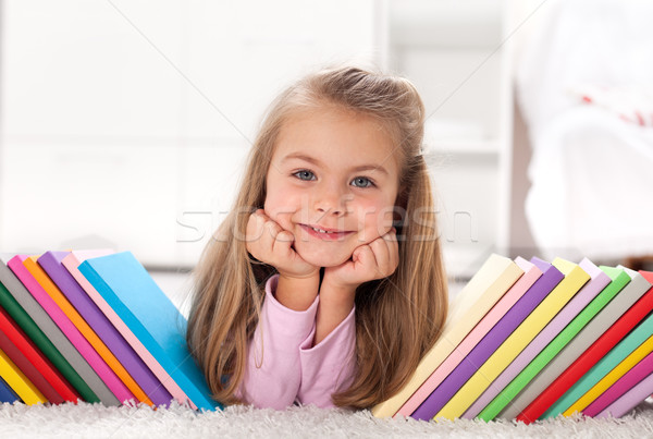 Little girl discovering the world of books Stock photo © ilona75