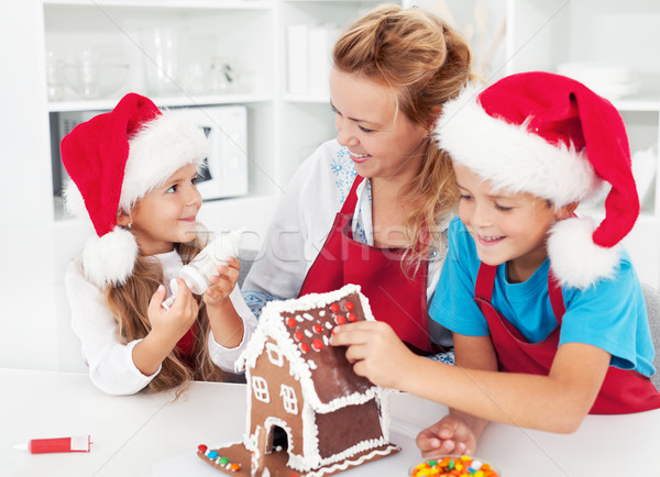 Making a gingerbread cookie house with the kids Stock photo © ilona75