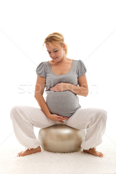 Pregnant woman admiring her belly Stock photo © ilona75