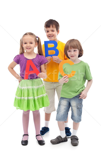 Back to school - kids holding large abc letters Stock photo © ilona75