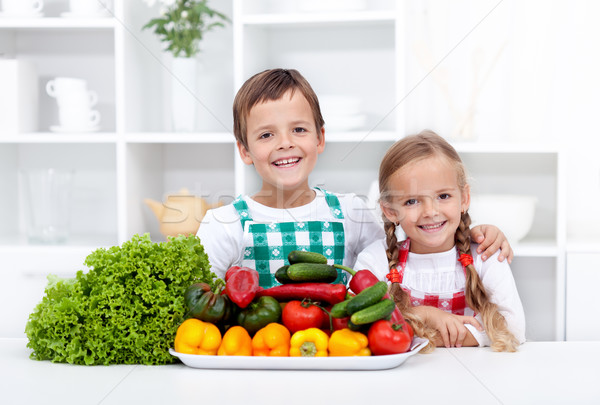 Happy healthy kids with vegetables Stock photo © ilona75