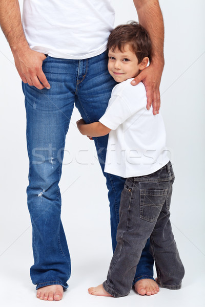 Child holding his father leg - safety and security concept Stock photo © ilona75