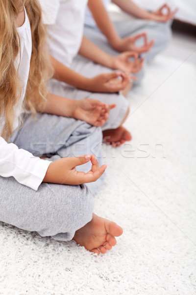Lotus positie yoga ontspanning detail kinderen Stockfoto © ilona75