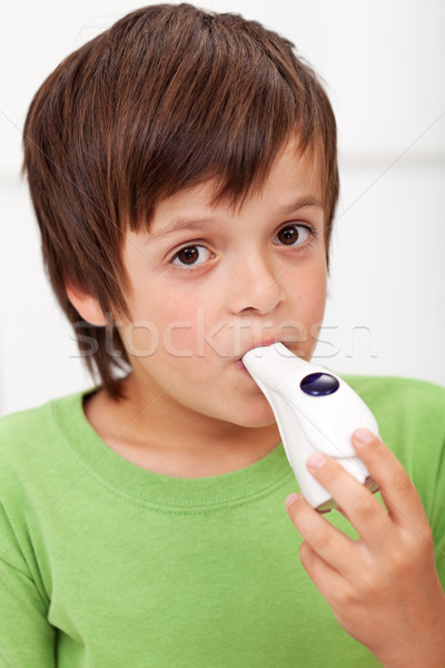 Boy with inhaler - closeup Stock photo © ilona75