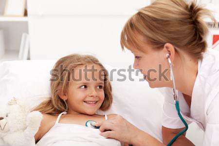 Little girl recovering - checked by doctor Stock photo © ilona75