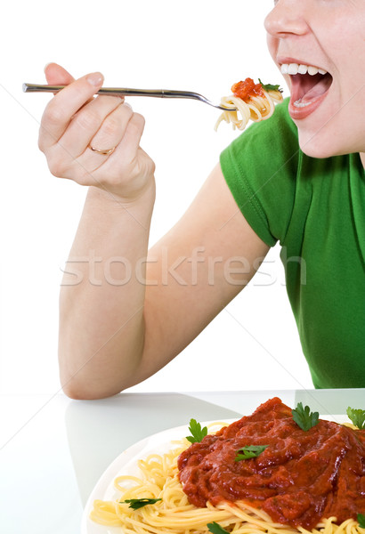 Mulher morder macarrão alimentação isolado Foto stock © ilona75