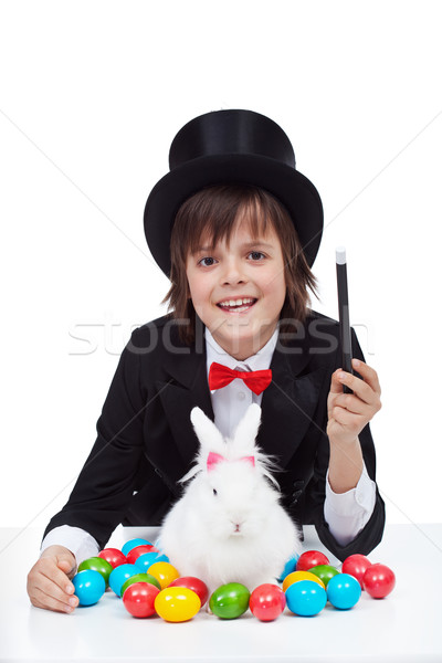 Young magician boy preparing for easter Stock photo © ilona75
