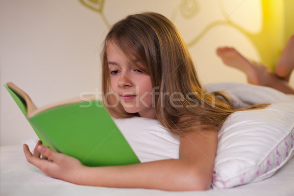 Young girl on her belly  