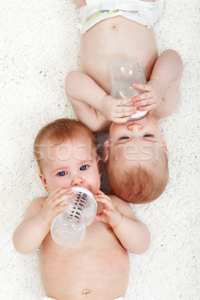 Bebés agua potable botellas agua Foto stock © ilona75