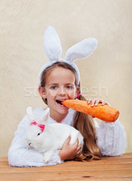 Happy easter costume girl holding her bunny Stock photo © ilona75