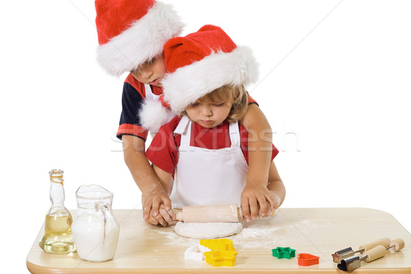 Stock photo: Little boy and girl making christmas cookies