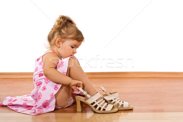 Trying mom's shoes Stock photo © ilona75