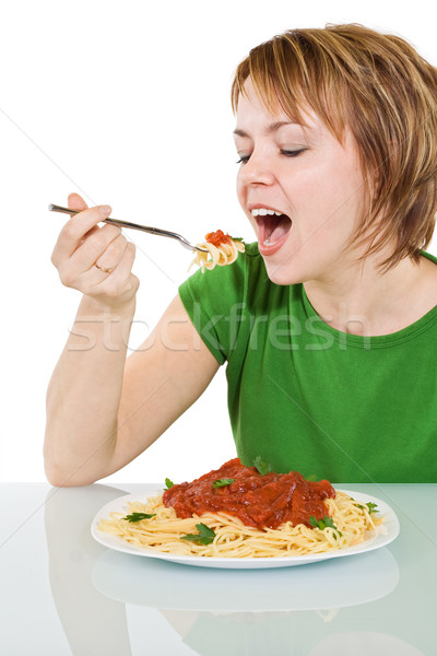 Feliz mujer comer pasta verde camisa Foto stock © ilona75