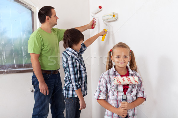 Kids and their father painting a room Stock photo © ilona75