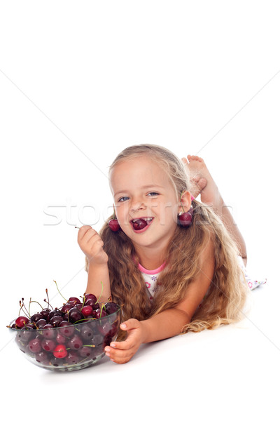 Healthy seasonal fruit snack - little girl with summer cherries  Stock photo © ilona75