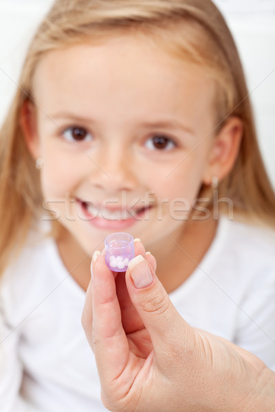 Girl receiving homeopathic medication Stock photo © ilona75