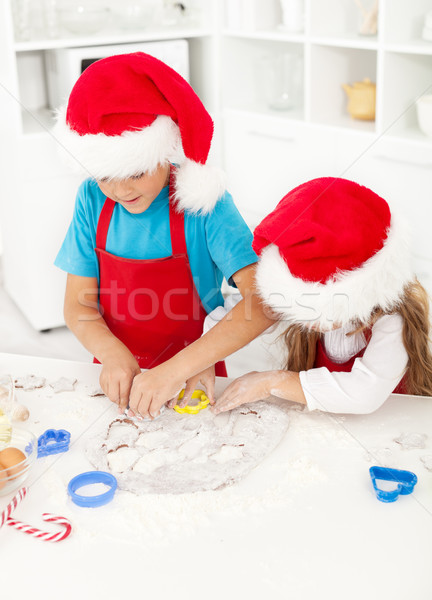 Stock photo: Kids making christmas cookies