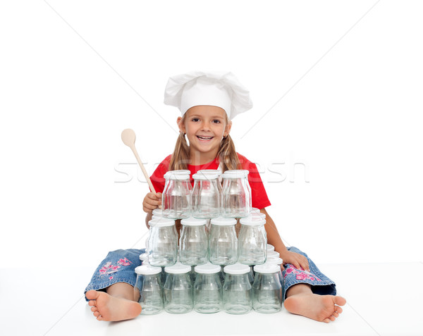 Happy chef girl with jars for canning Stock photo © ilona75