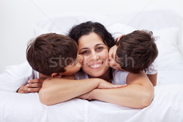 Happy mother and her loving little boys Stock photo © ilona75