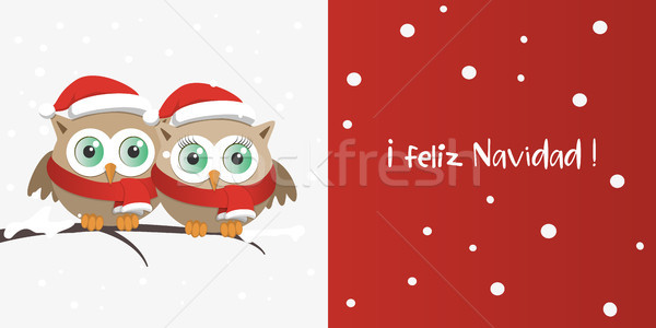 Couple of owls with Santa Claus hat on a branch in a snowy day Stock photo © Imaagio