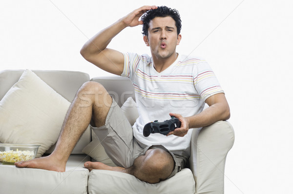 Człowiek gry gra wideo gry kontroli Zdjęcia stock © imagedb