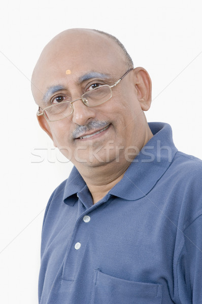 Portré férfi mosolyog mosoly kék boldogság Stock fotó © imagedb