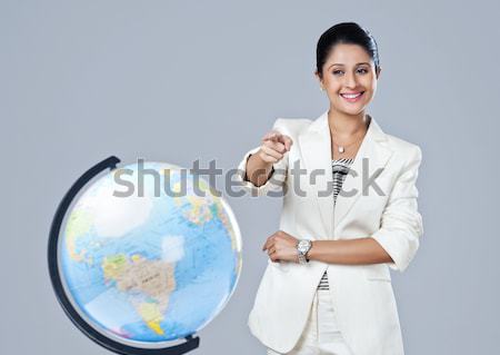 Portrait femme d'affaires permanent monde affaires [[stock_photo]] © imagedb
