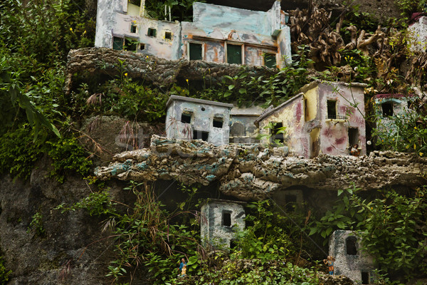 Miniature houses on the rocks Stock photo © imagedb
