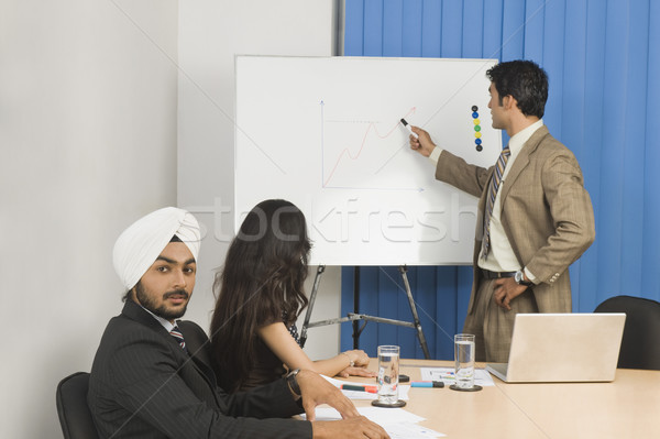 бизнесмен презентация конференц-зал воды заседание ноутбука Сток-фото © imagedb
