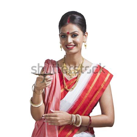 Bengali woman holding a puja thali Stock photo © imagedb