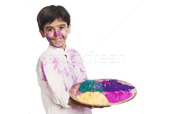Boy holding Holi colors in a plate Stock photo © imagedb