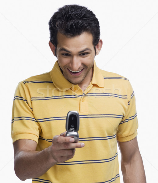 Közelkép férfi sms üzenetküldés mobiltelefon technológia kommunikáció Stock fotó © imagedb