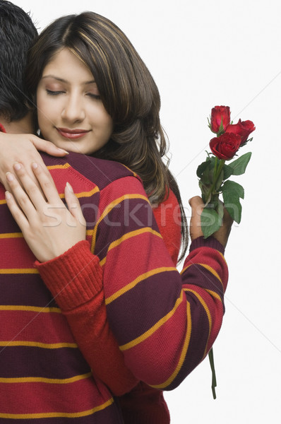 Pár ölel nő férfi rózsa nők Stock fotó © imagedb